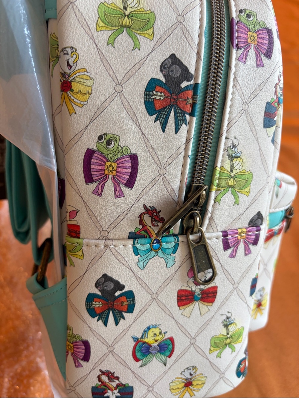 Loungefly Cream Mini Backpack with Multicolor Sidekick Bows - Picture 3 of 5